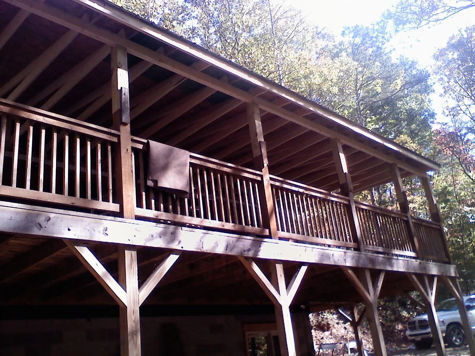 Timber framing under a new elevated porch and deck — Roof Leak Repair in Portland by Roofing Brothers